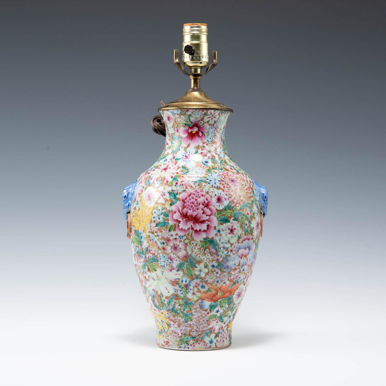 A Chinese famille rose 'mille fleur' vase lamp, Republic period (1 of 4)
