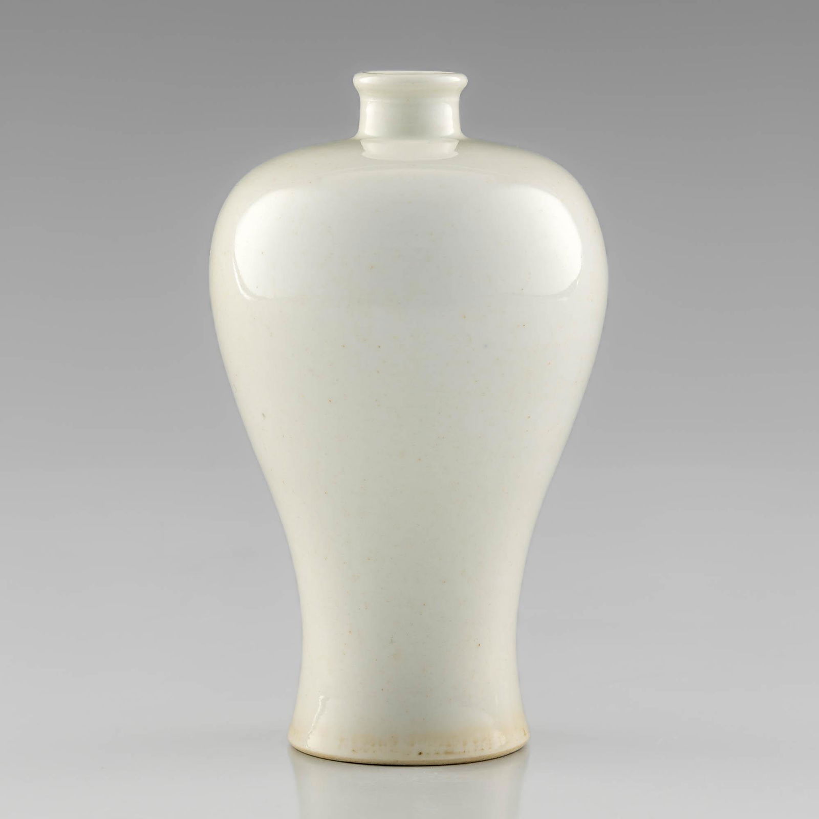 A Chinese white-glazed meiping vase, 18th century (1 of 9)
