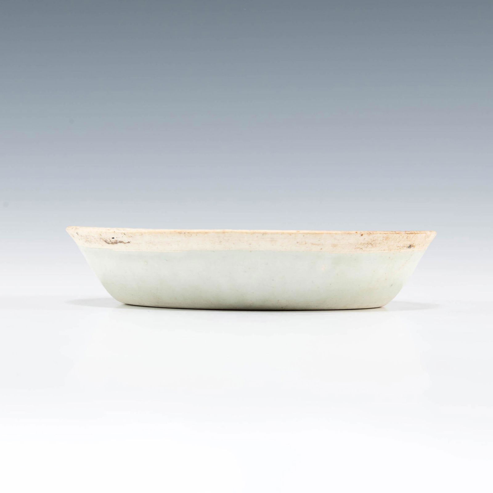A Chinese celadon Yingqing dish, Song dynasty (1 of 3)