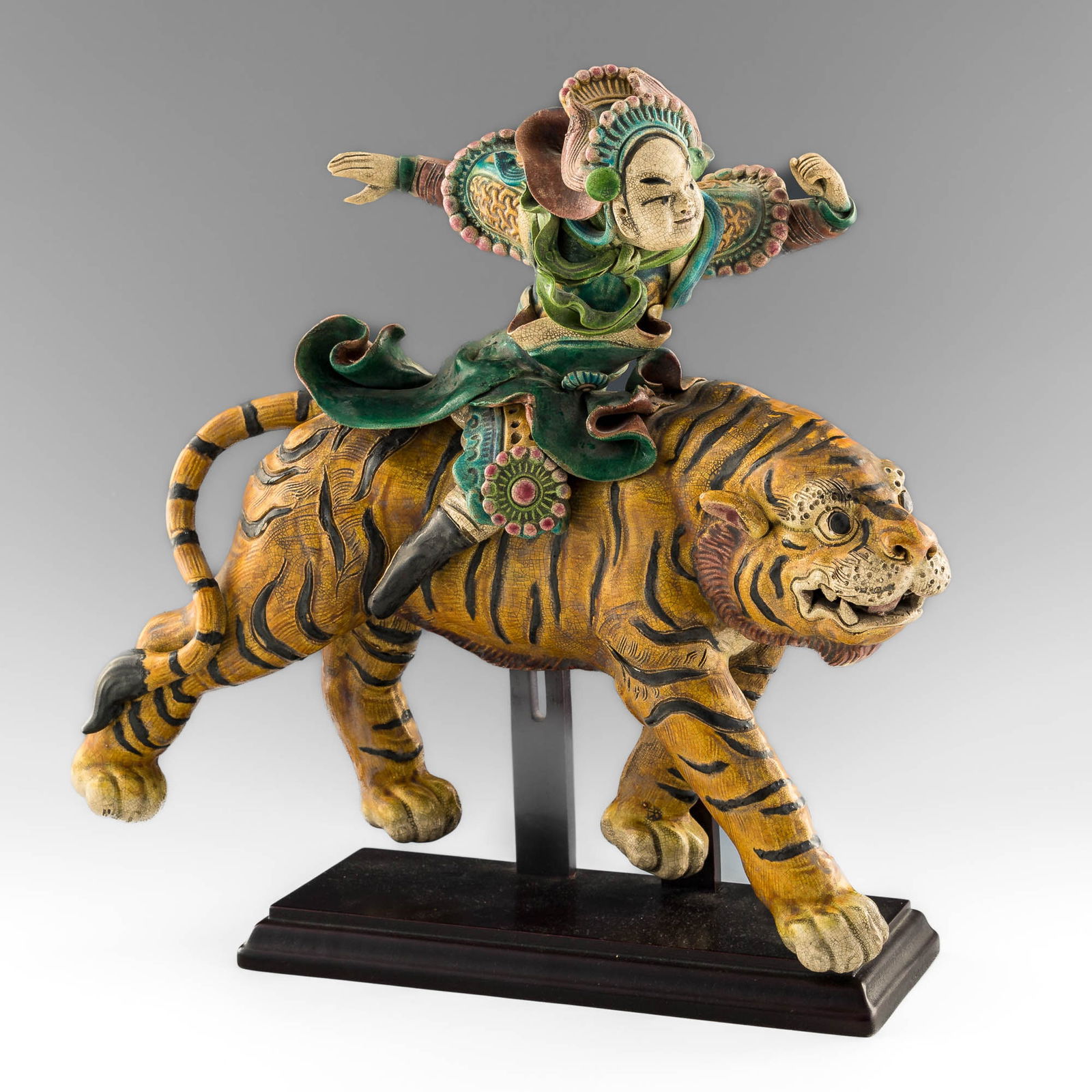 A Chinese ceramic sculpture of warrior riding a tiger, Republic period (1 of 11)