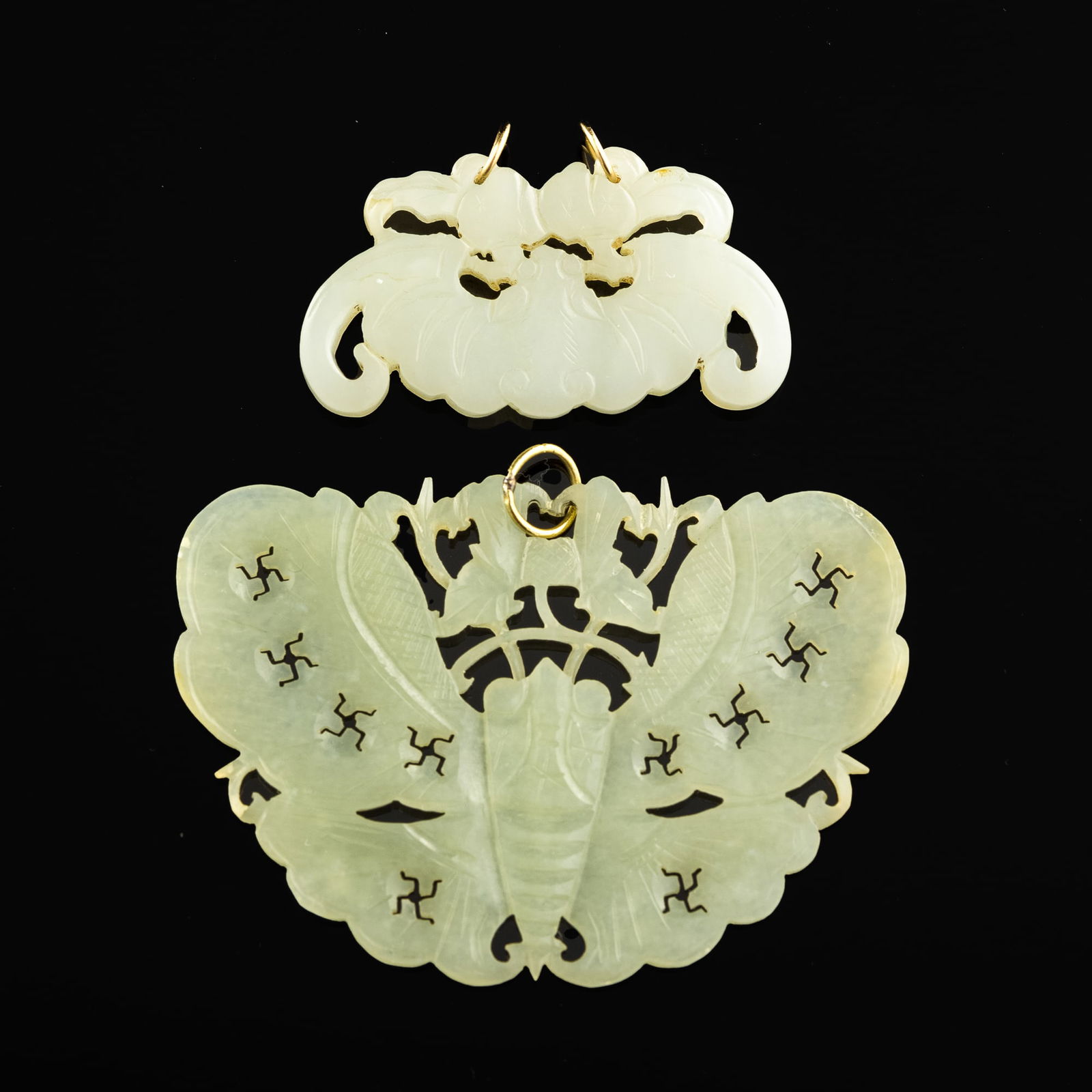 Two Chinese pierced white jade plaques, 18th/19th century (1 of 3)