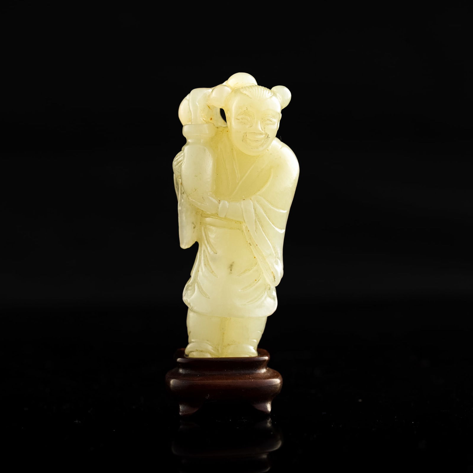 A Chinese carved jade 'child' toggle with potted plant, 19th century (1 of 7)