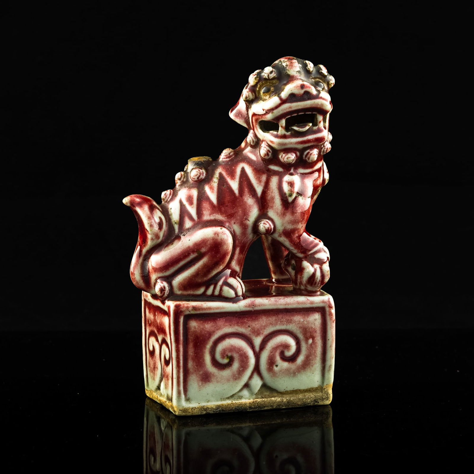 A Chinese red-glazed lion statue, 19th century (1 of 9)