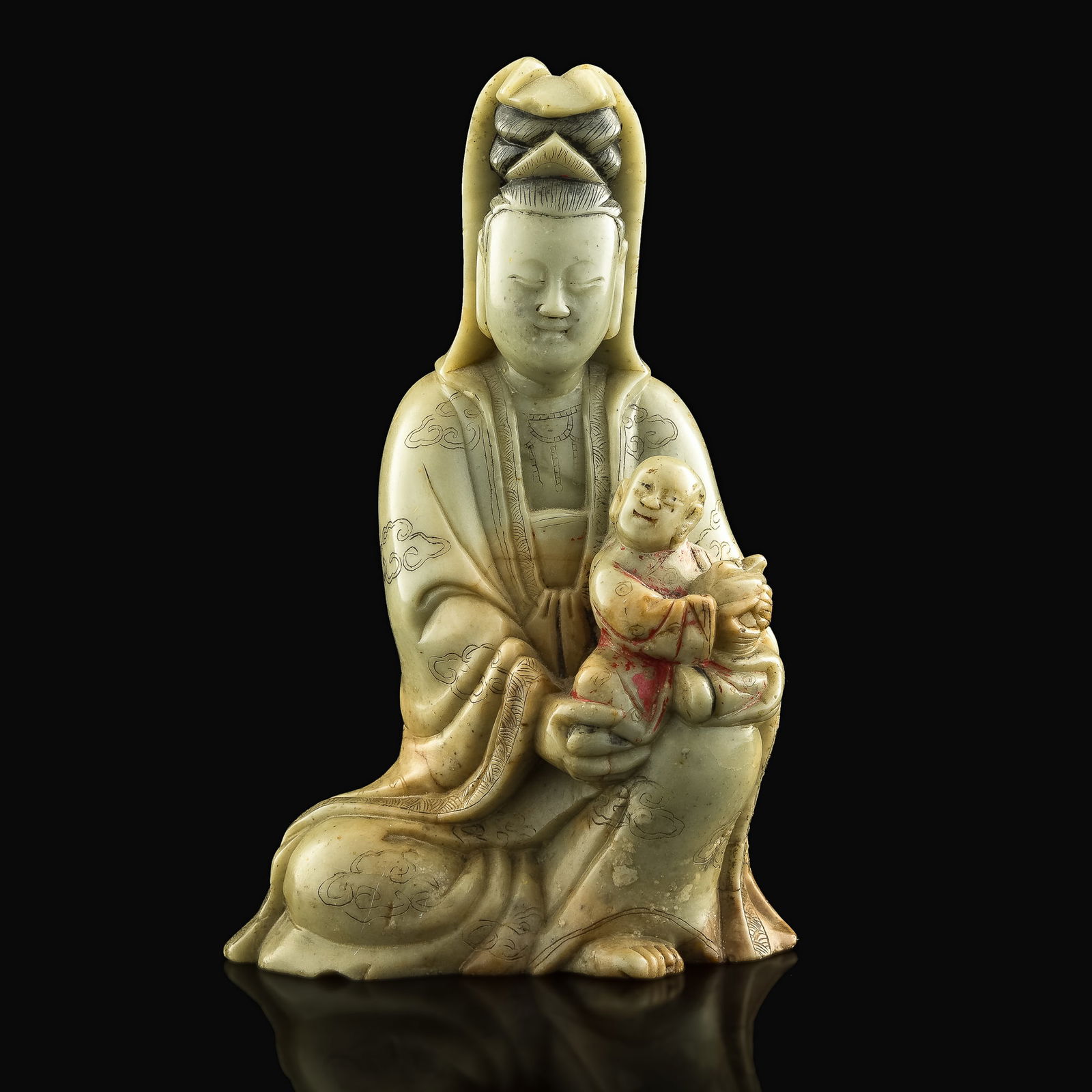 A Chinese carved soapstone statue of Guanyin with boy attendant, 19th century (1 of 9)