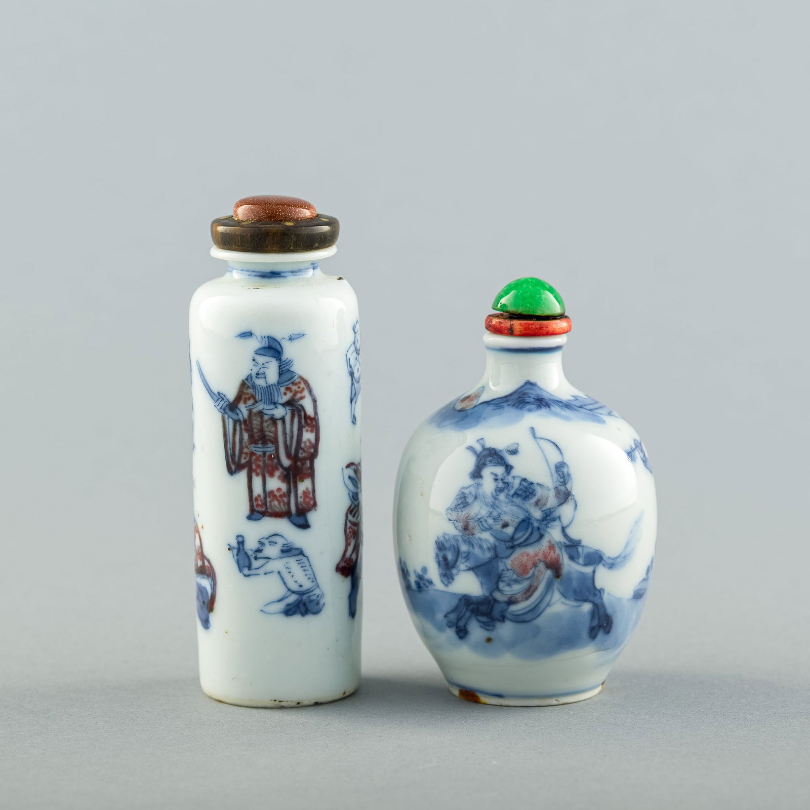 Two Chinese copper-red and blue underglaze-decorated 'landscape' snuff bottles, 19th century (1 of 8)
