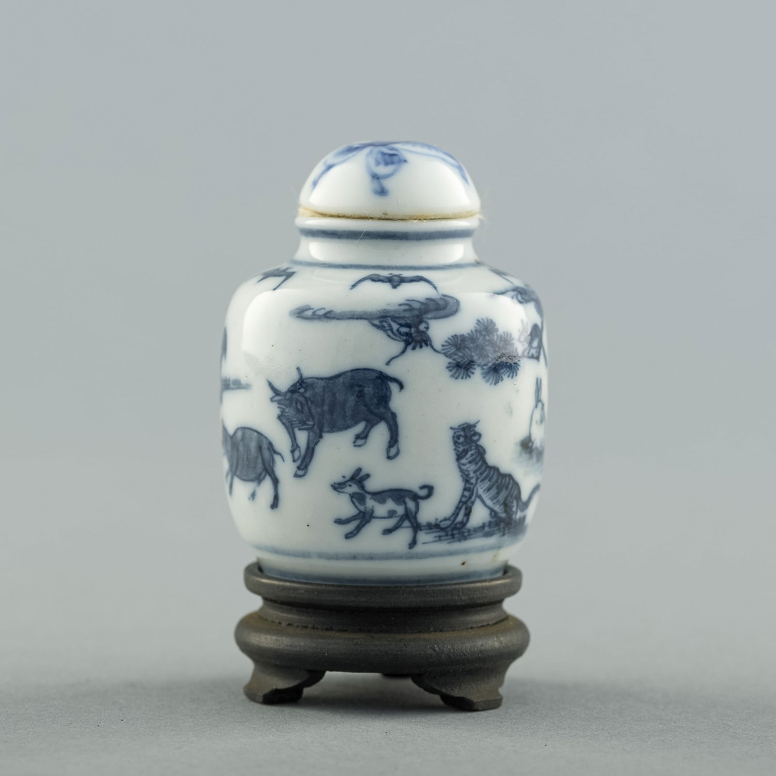A Chinese blue and white 'zodiac' snuff bottle, Daoguang period, Qing dynasty (1 of 8)