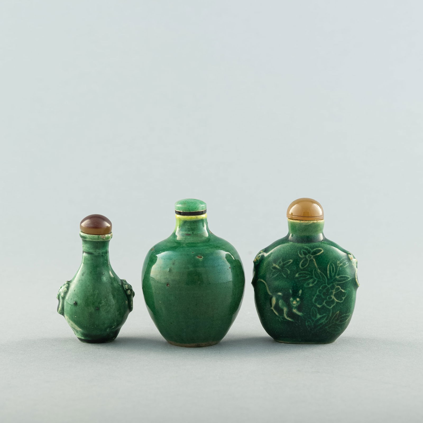 Three Chinese green-glazed snuff bottles, 19th century (1 of 7)