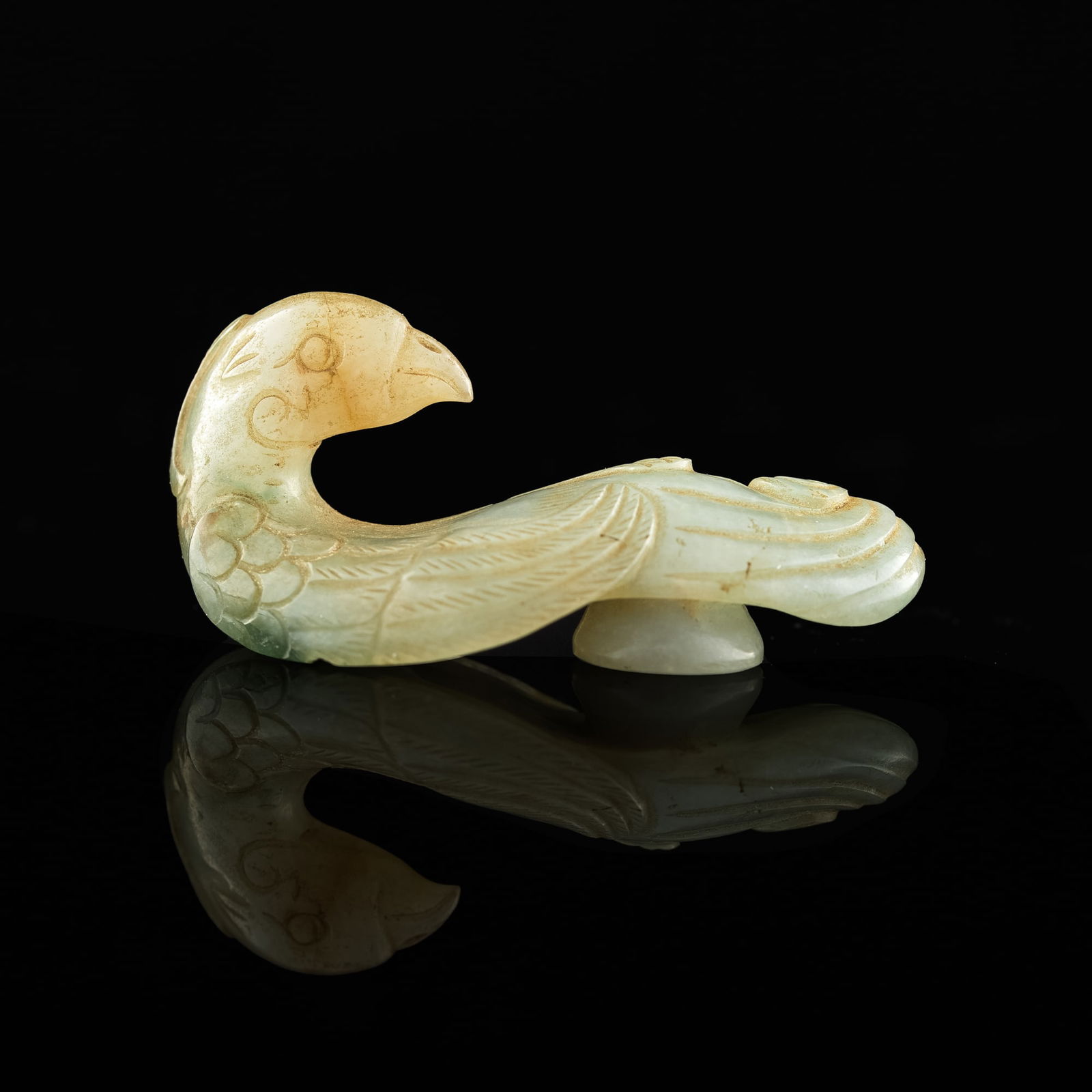 A Chinese carved jadeite phoenix-form belt hook, 19th century (1 of 8)