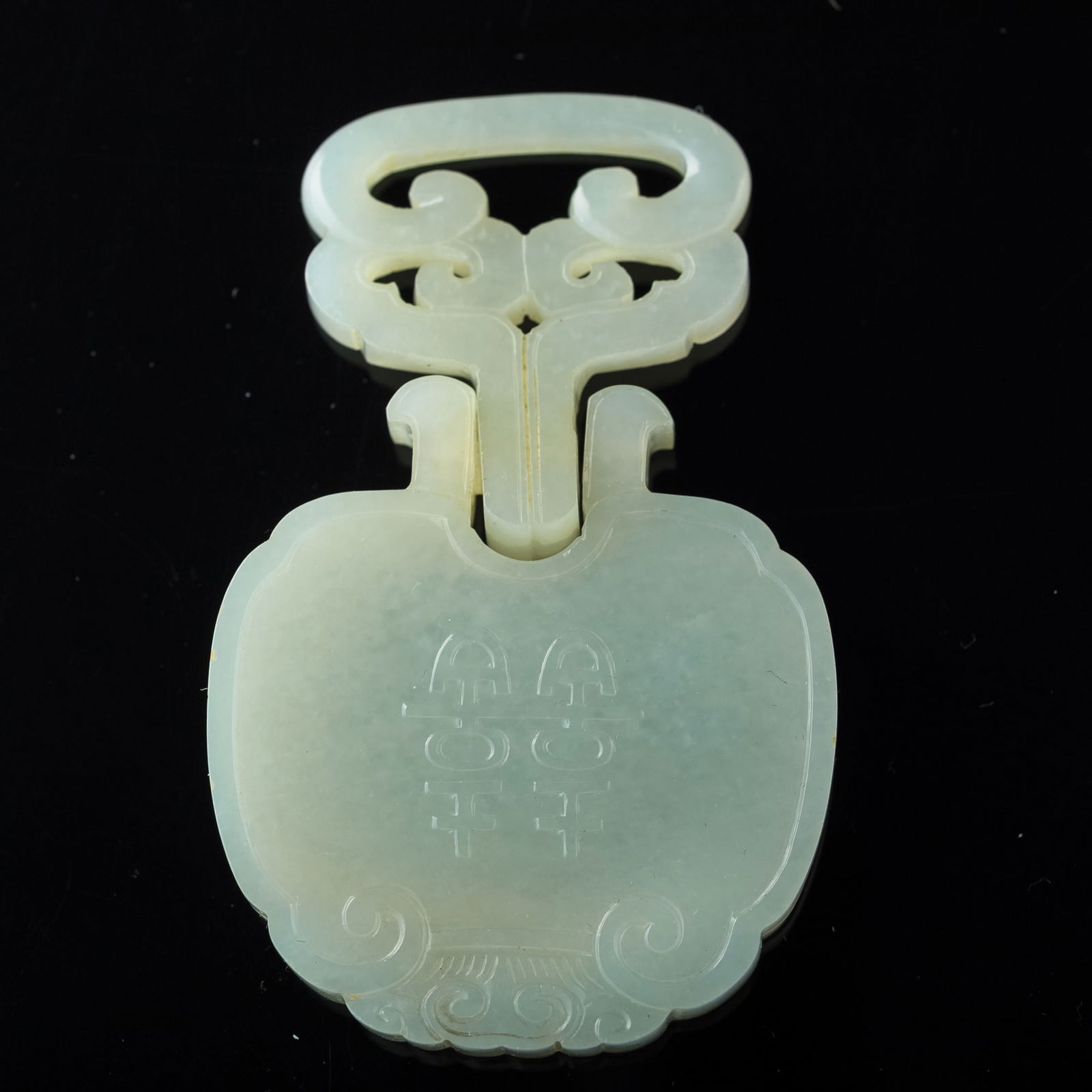 A Chinese carved jade 'double happiness' toggle, 18th century (1 of 6)