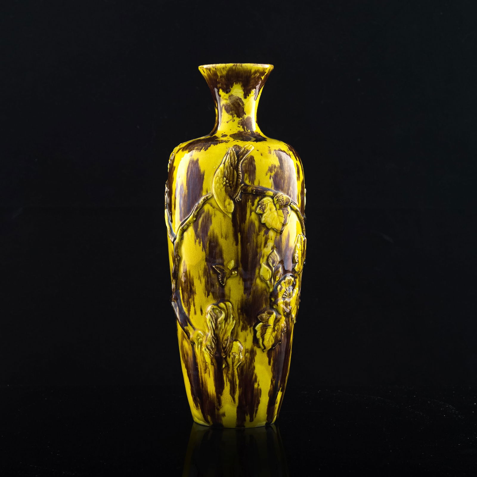 A Chinese sancai-glazed carved porcelain vase, 19th century (1 of 10)