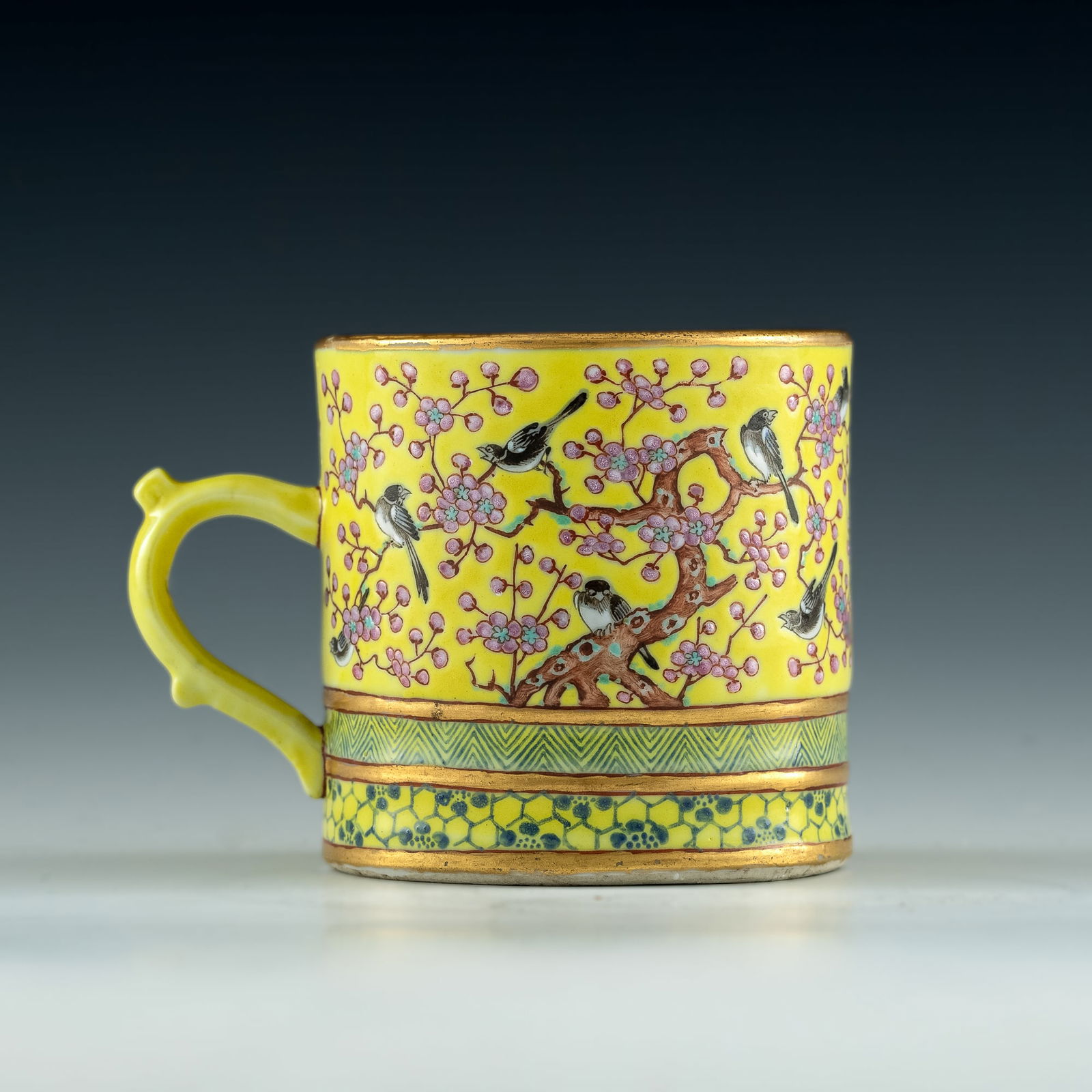 A Chinese yellow-ground famille rose cup with handle, 19th century (1 of 6)
