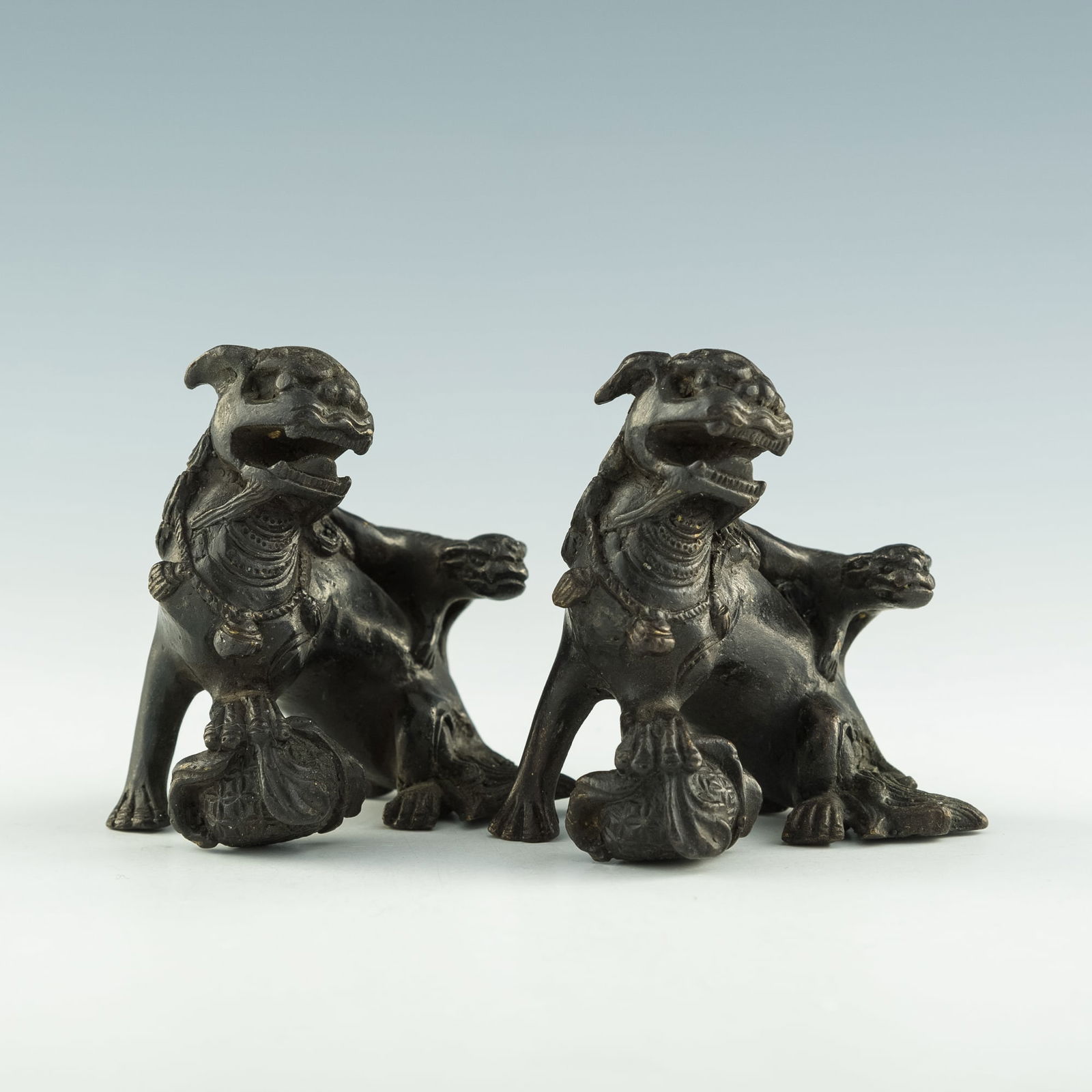 A pair of Chinese bronze lion-form paper weights, Qing dynasty (1 of 7)