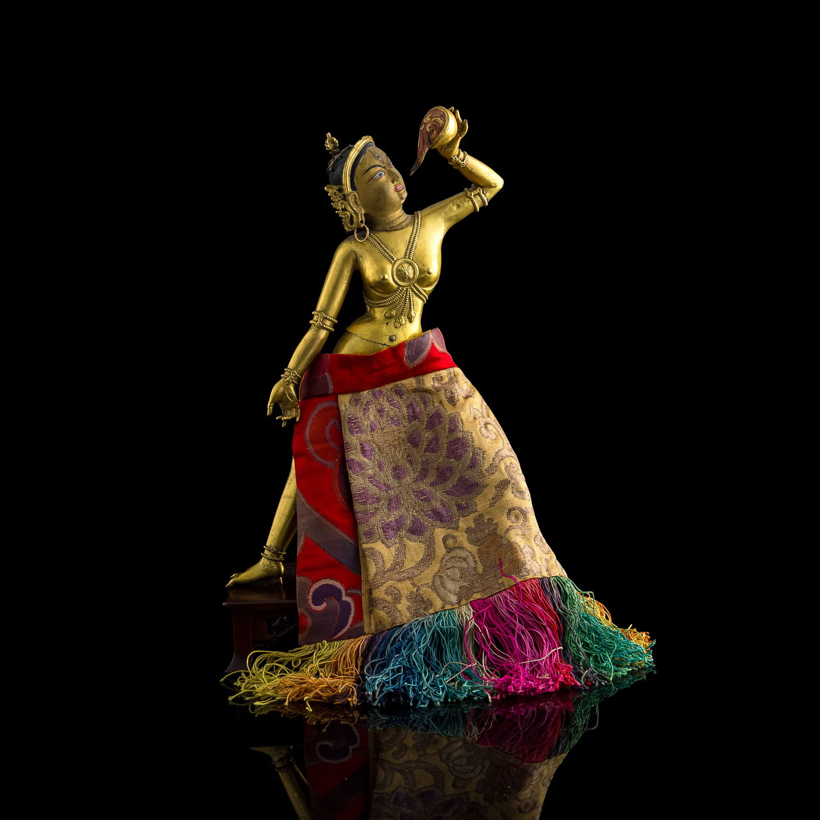 A Nepalese gilt-bronze statue of female deity, 17th/18th century (1 of 10)