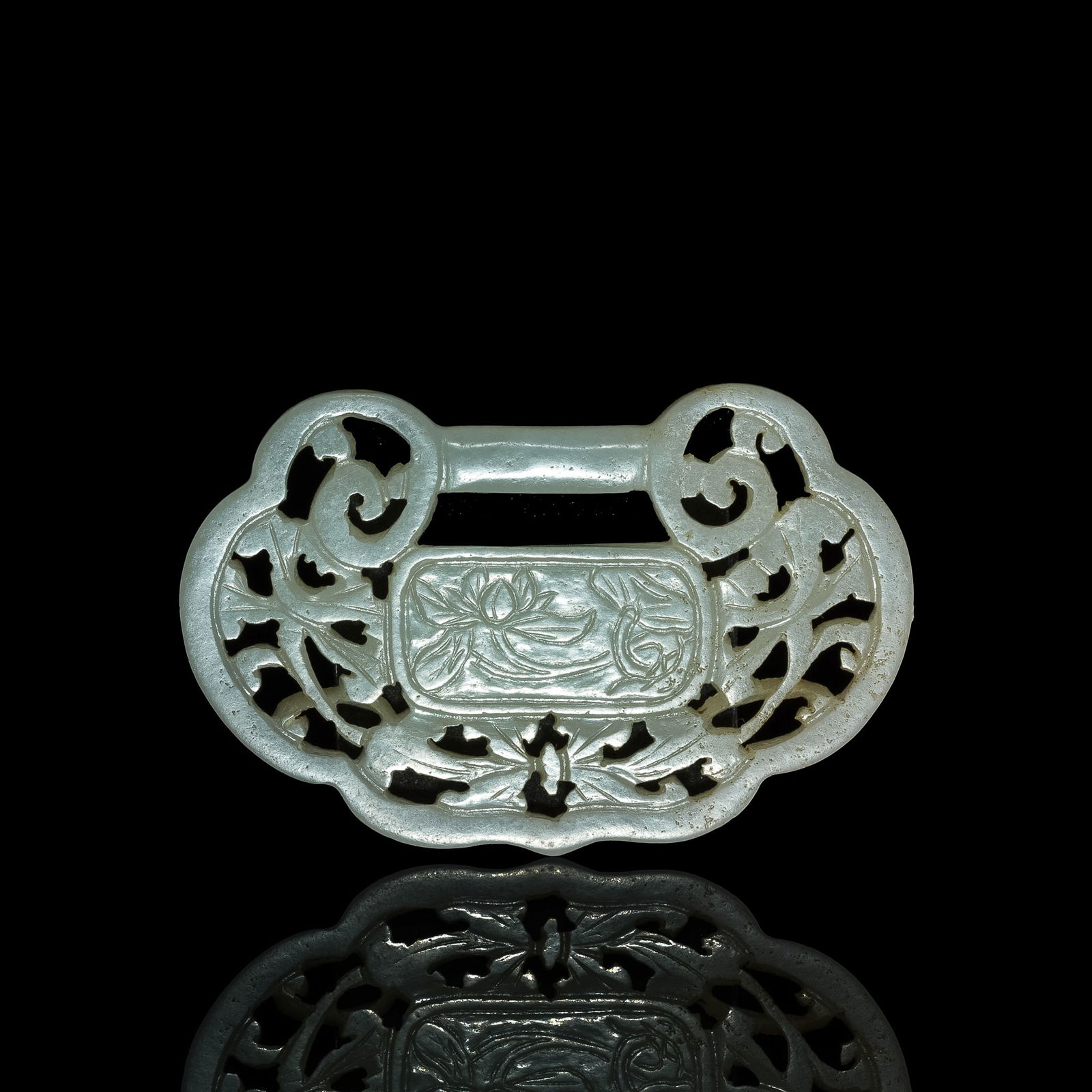 A Chinese carved jade lock-form plaque, 19th century (1 of 5)