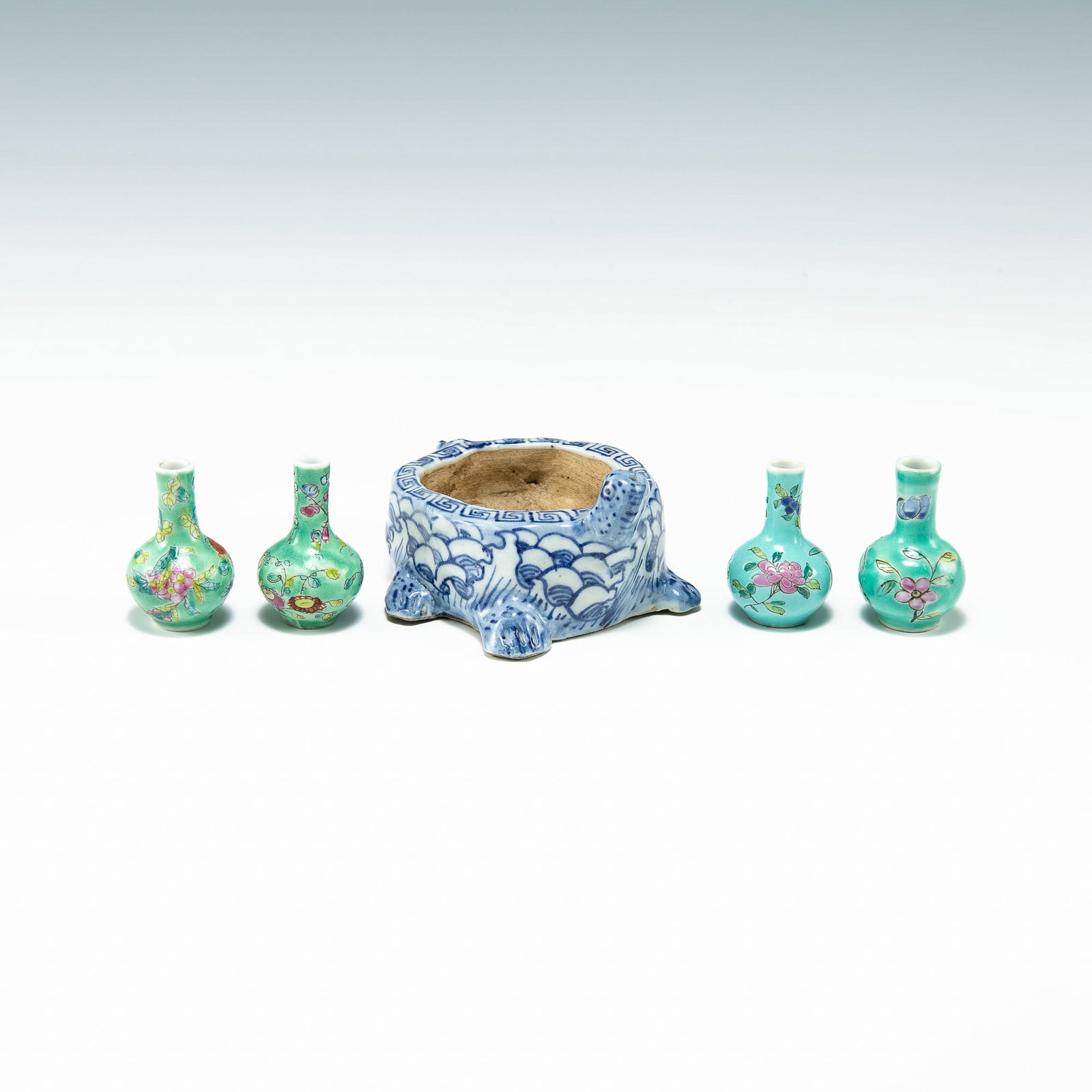 A group of five Chinese porcelains, 19th century: A group of five Chinese porcelains 19th century H: 2, W: 4, D: 4 1/4 in. (H: 5.08, W: 10.16, D: 10.79 cm. (largest)) Provenance: Private collection, Palm Springs, California. Please contact the Catalo