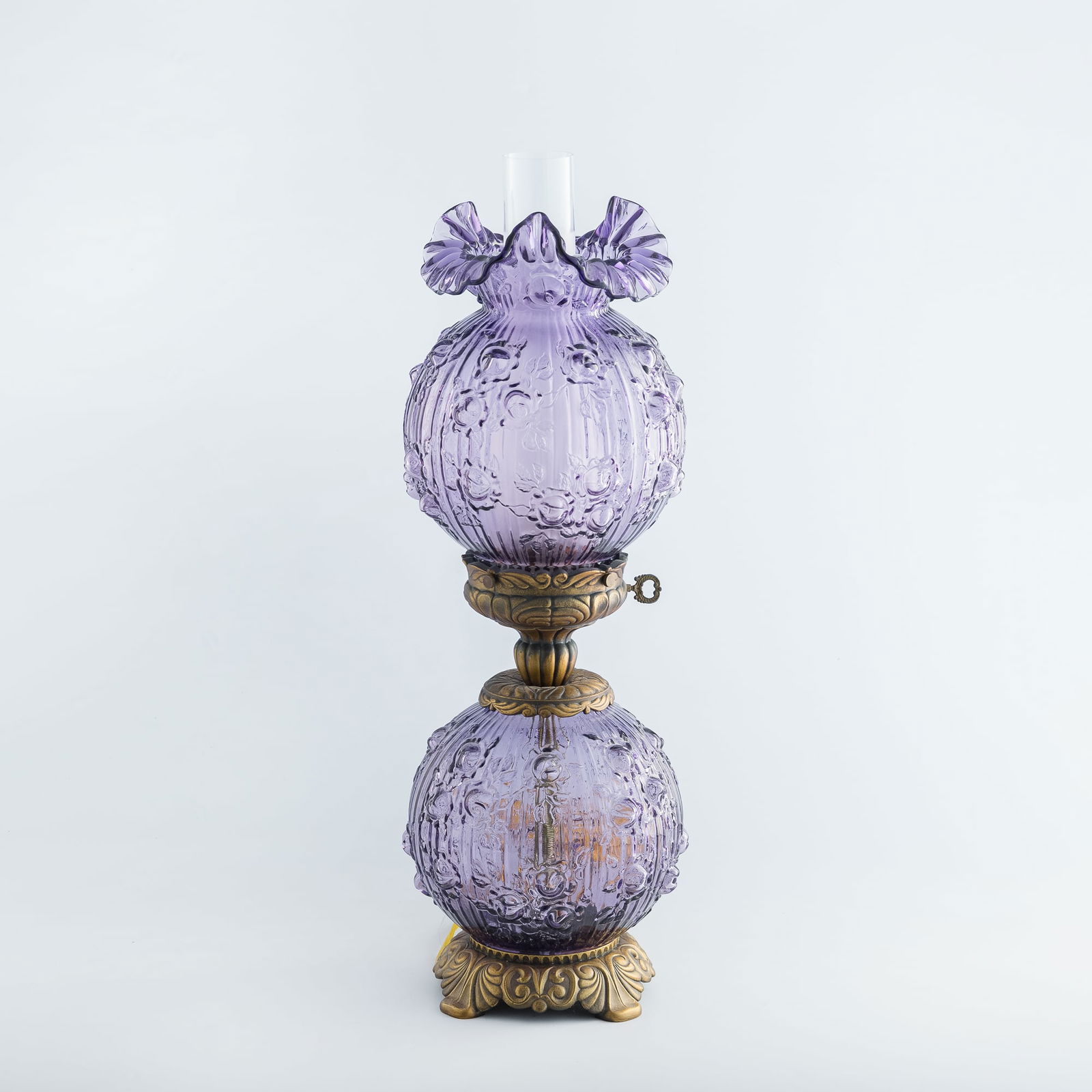 A Fenton amethyst rose 'Gone With The Wind' lamp, (1 of 6)