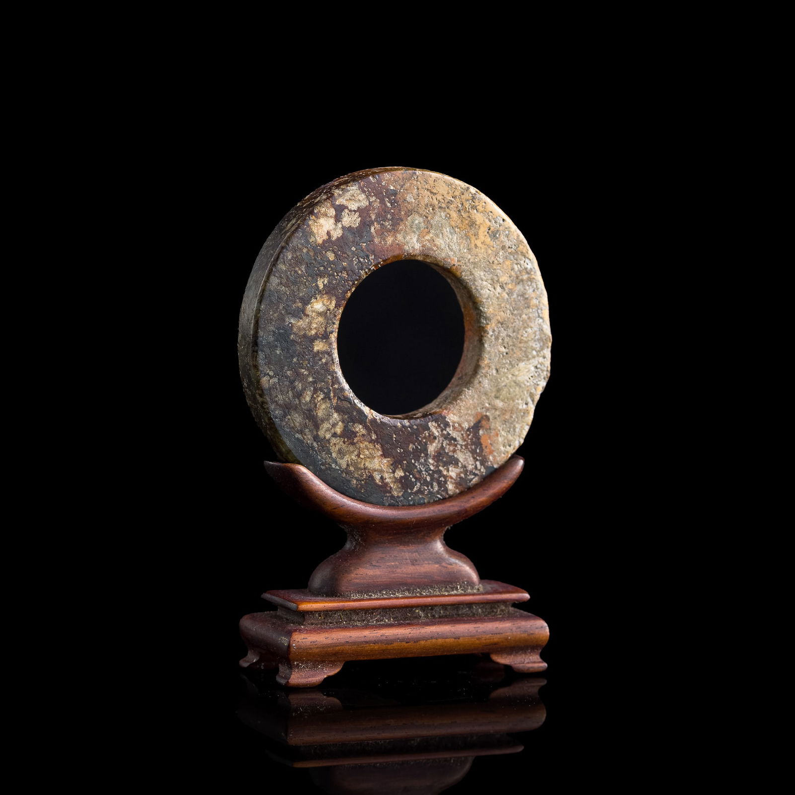 A Chinese carved jade ring, Ming dynasty or earlier (1 of 9)