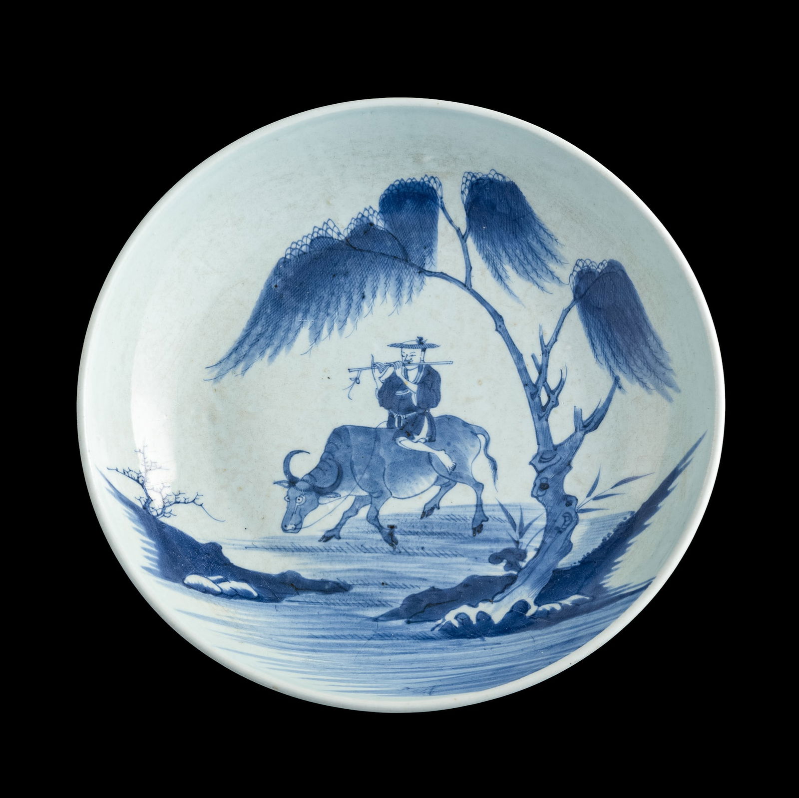 A Chinese blue and white 'boy riding buffalo' plate, 18th century (1 of 5)