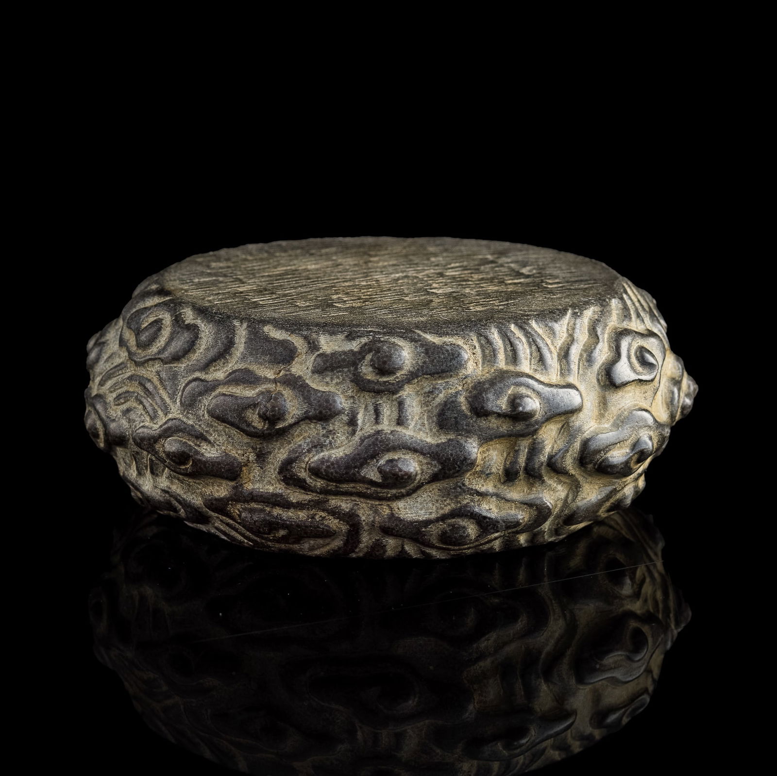 A Chinese stone stool, Qing dynasty (1 of 7)