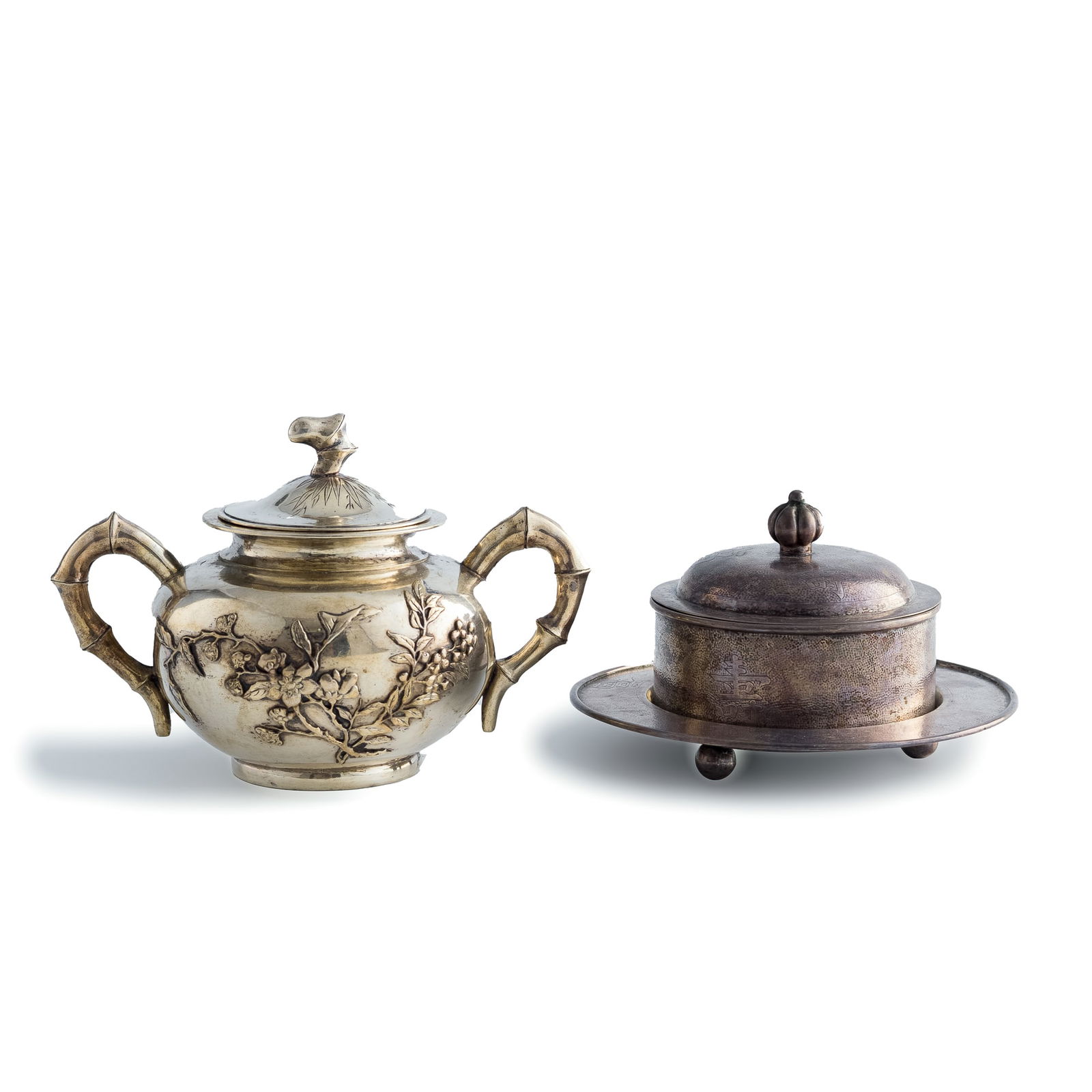 A Chinese silver lidded sugar bowl and a silver lidded cup with saucer, late 19th century (1 of 9)