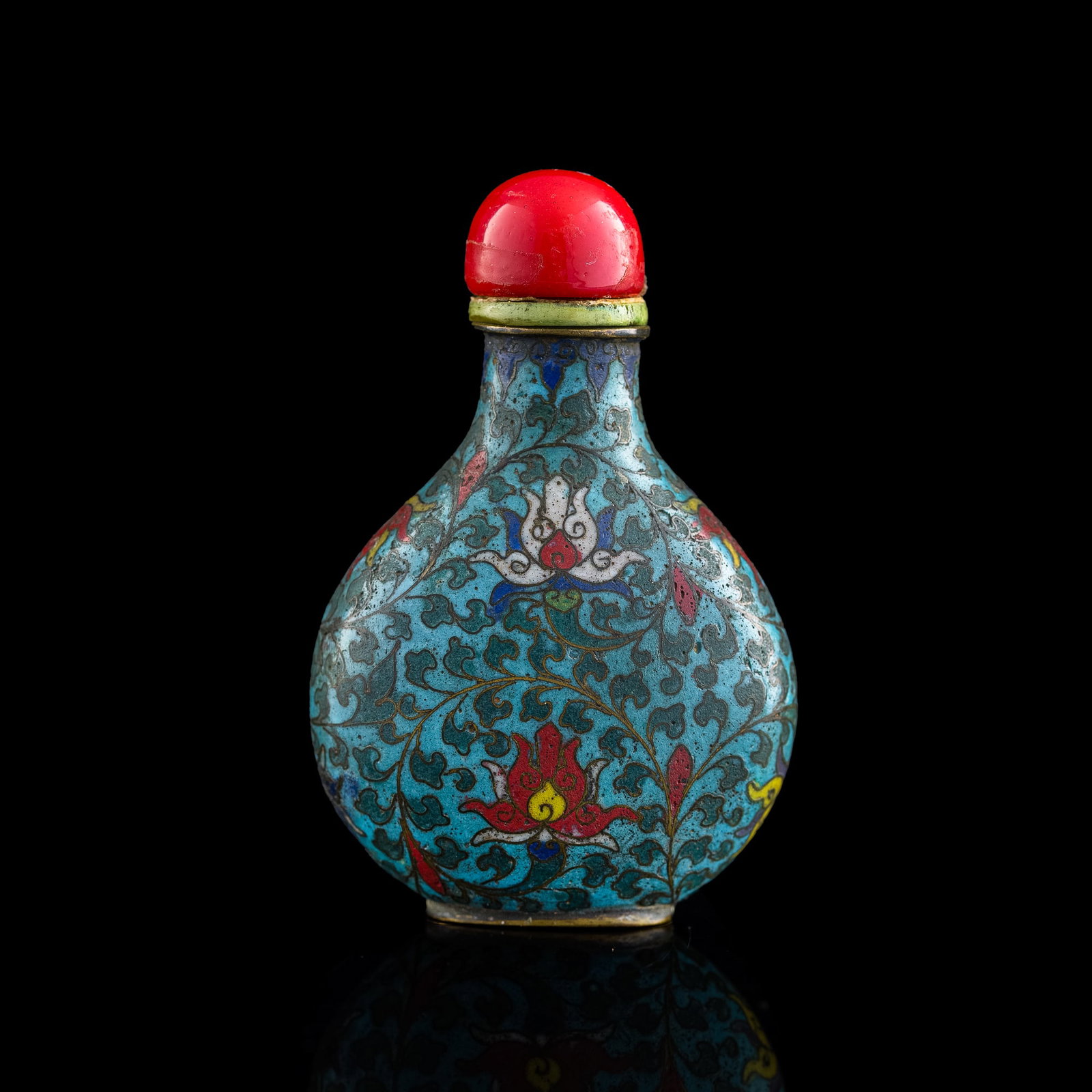 A Chinese cloisonne 'scrolling lotus' snuff bottle, 18th century: A Chinese cloisonne 'scrolling lotus' snuff bottle 18th century H: 2 1/2, W: 2 1/8 in. (H: 7.62, W: 5.40 cm.) Private collection, New York. Click