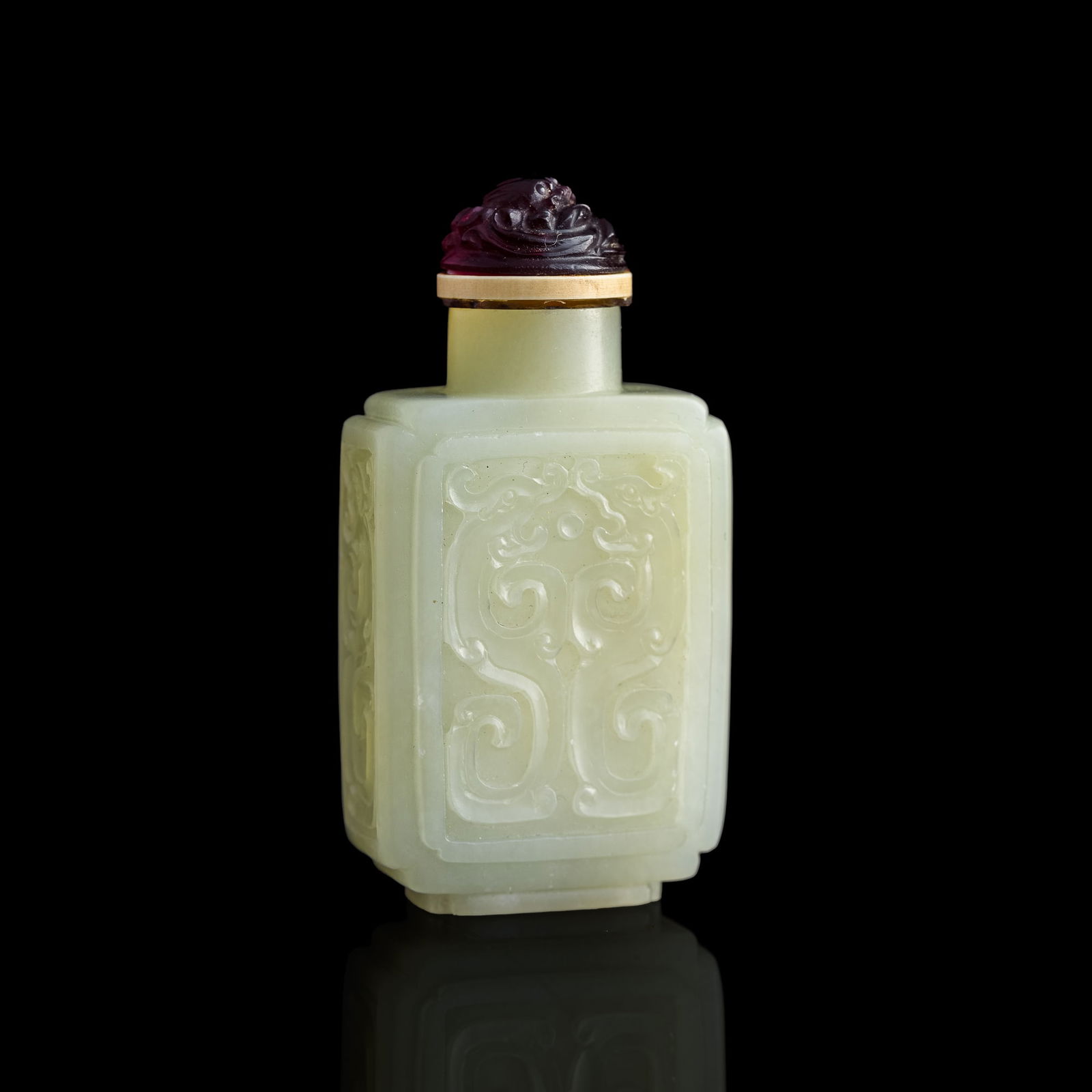 A Chinese carved white jade 'chilong' snuff bottle, 18th century (1 of 8)