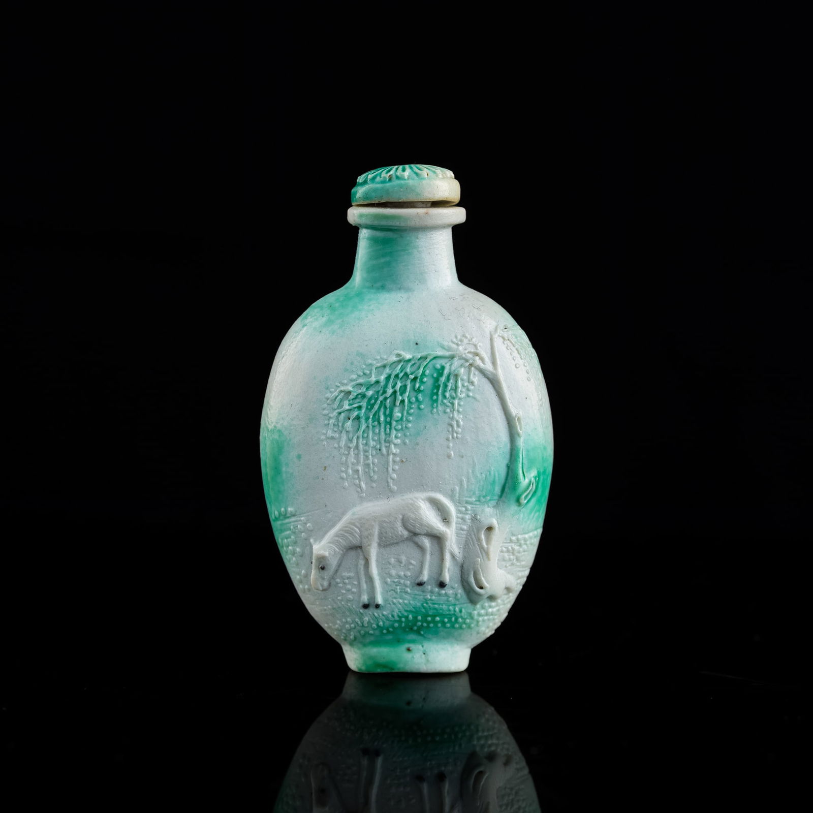 A Chinese 'imitation jadeite' molded porcelain snuff bottle, 19th century (1 of 7)