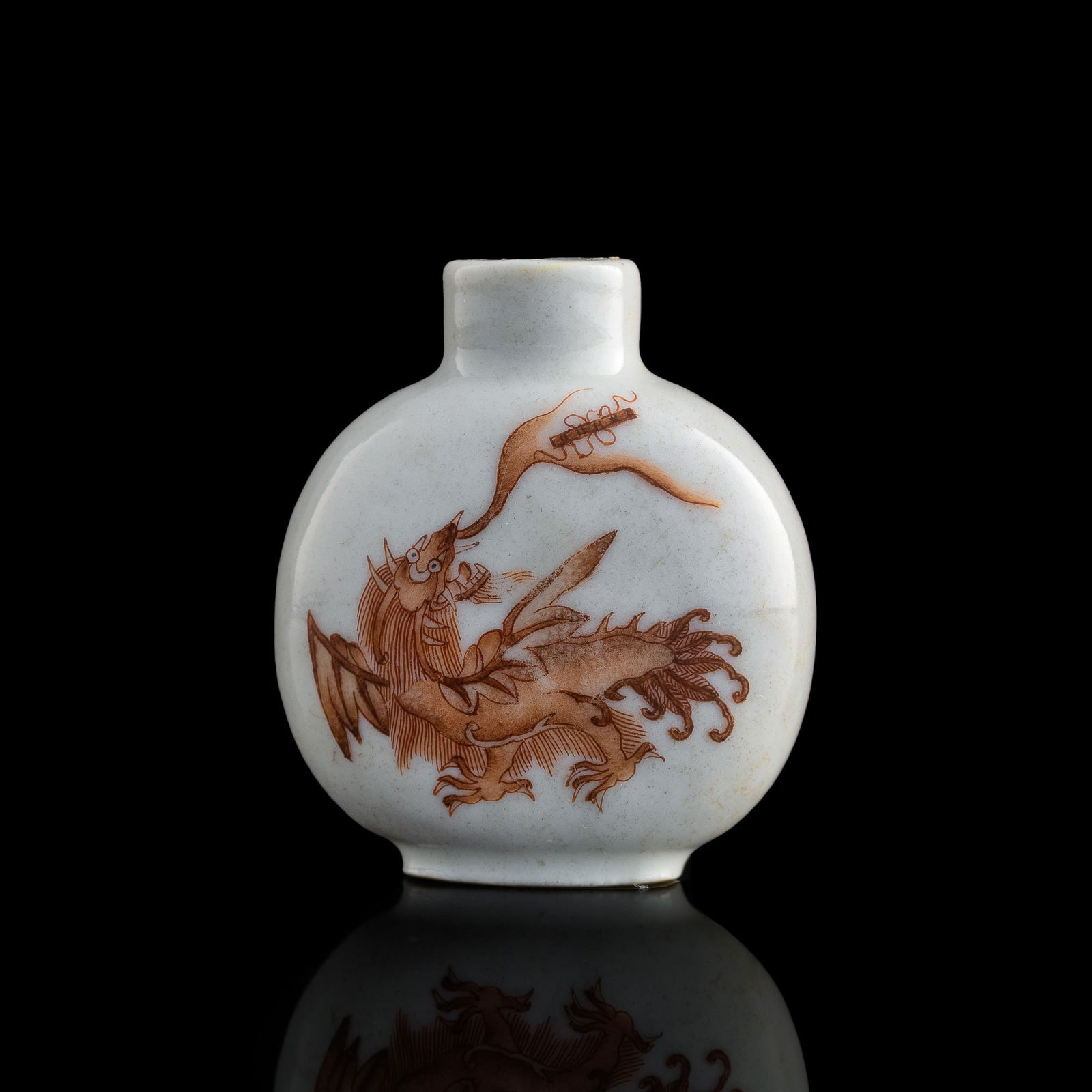 A Chinese iron-red snuff bottle, Daoguang period, Qing dynasty (1 of 9)