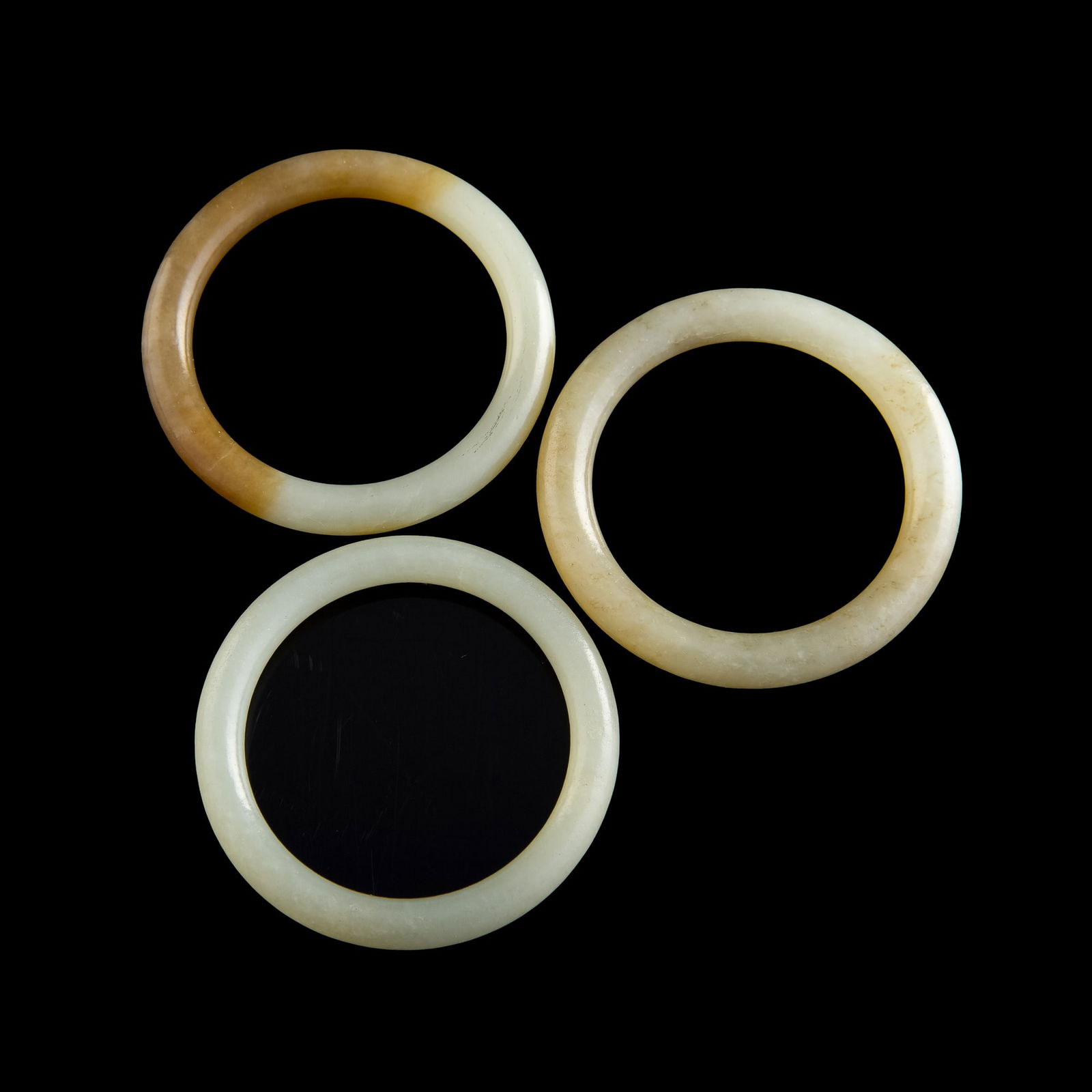 Three Chinese jade bangles, Qing dynasty (1 of 7)