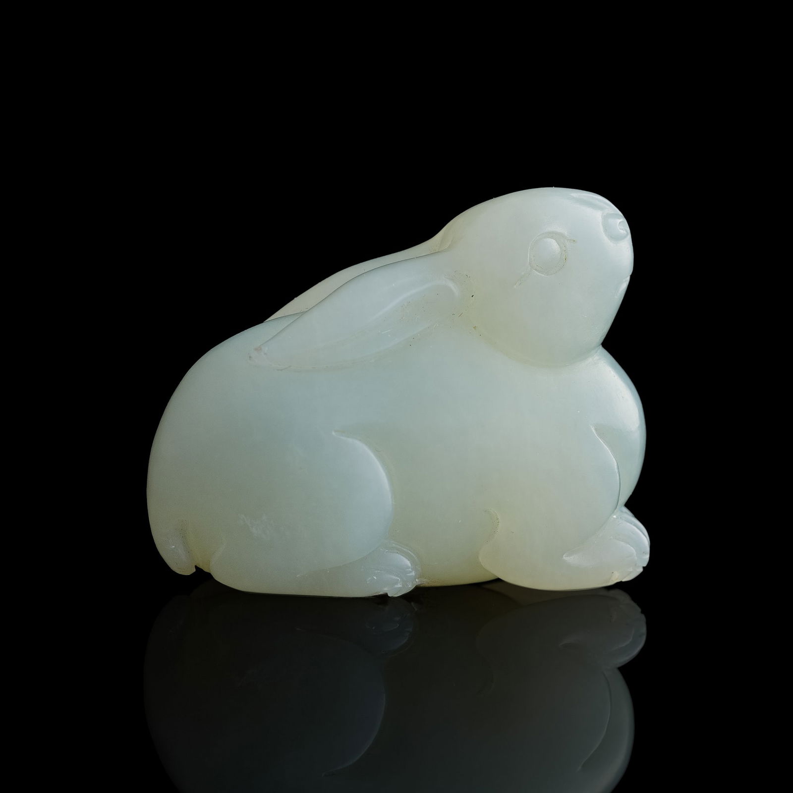 A Chinese carved white jade 'rabbit' toggle, 18th century (1 of 6)
