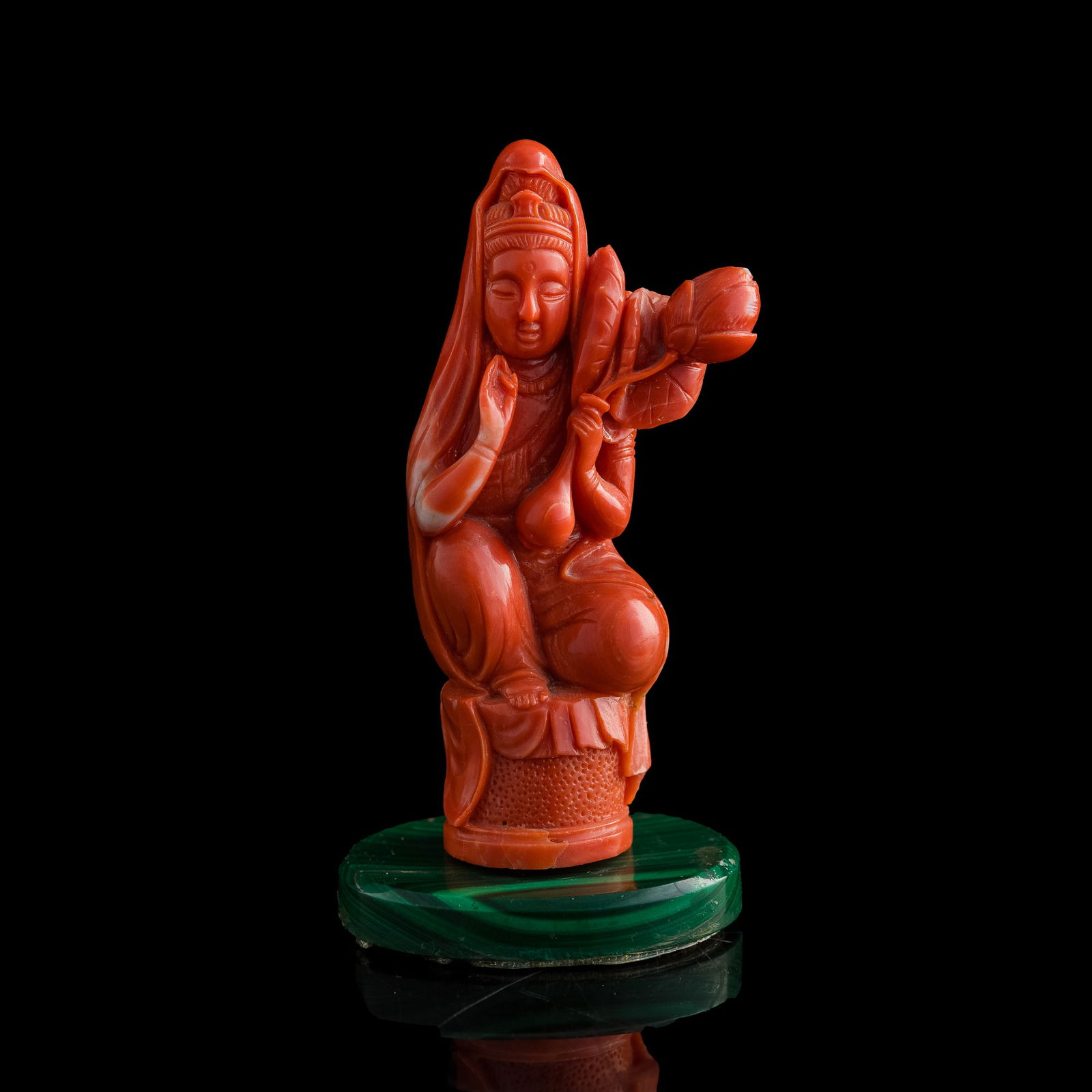 A Chinese carved coral Guanyin figurine, 19th century (1 of 8)