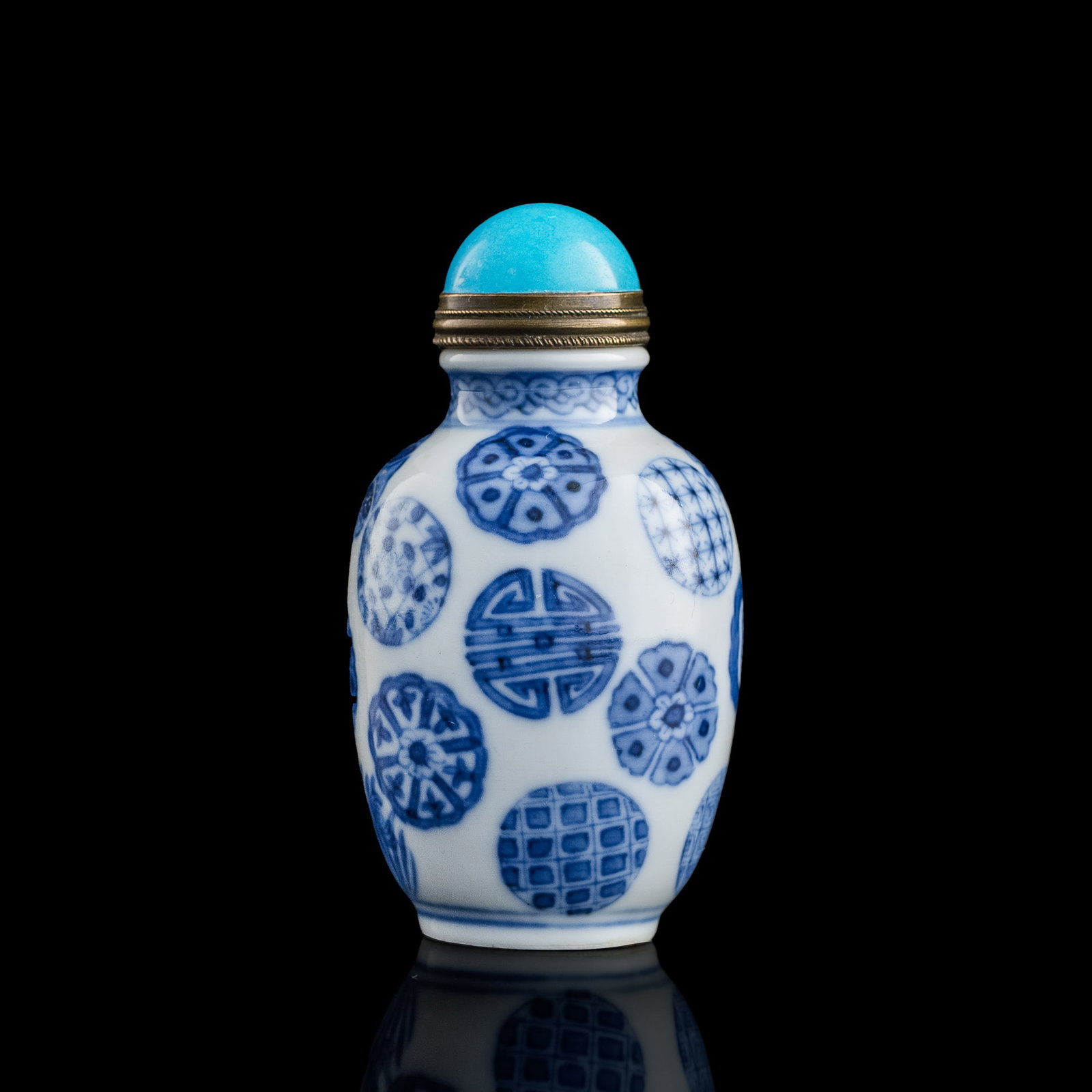 A Chinese blue and white 'medallions' snuff bottle, 19th century: A Chinese blue and white 'medallions' snuff bottle 19th century With four-character mark to underside. H: 2 3/8, Dia: 1 5/8 in. (H: 6.03, Dia: 4.13 cm.) Provenance: Private collection, Cleveland, Ohio
