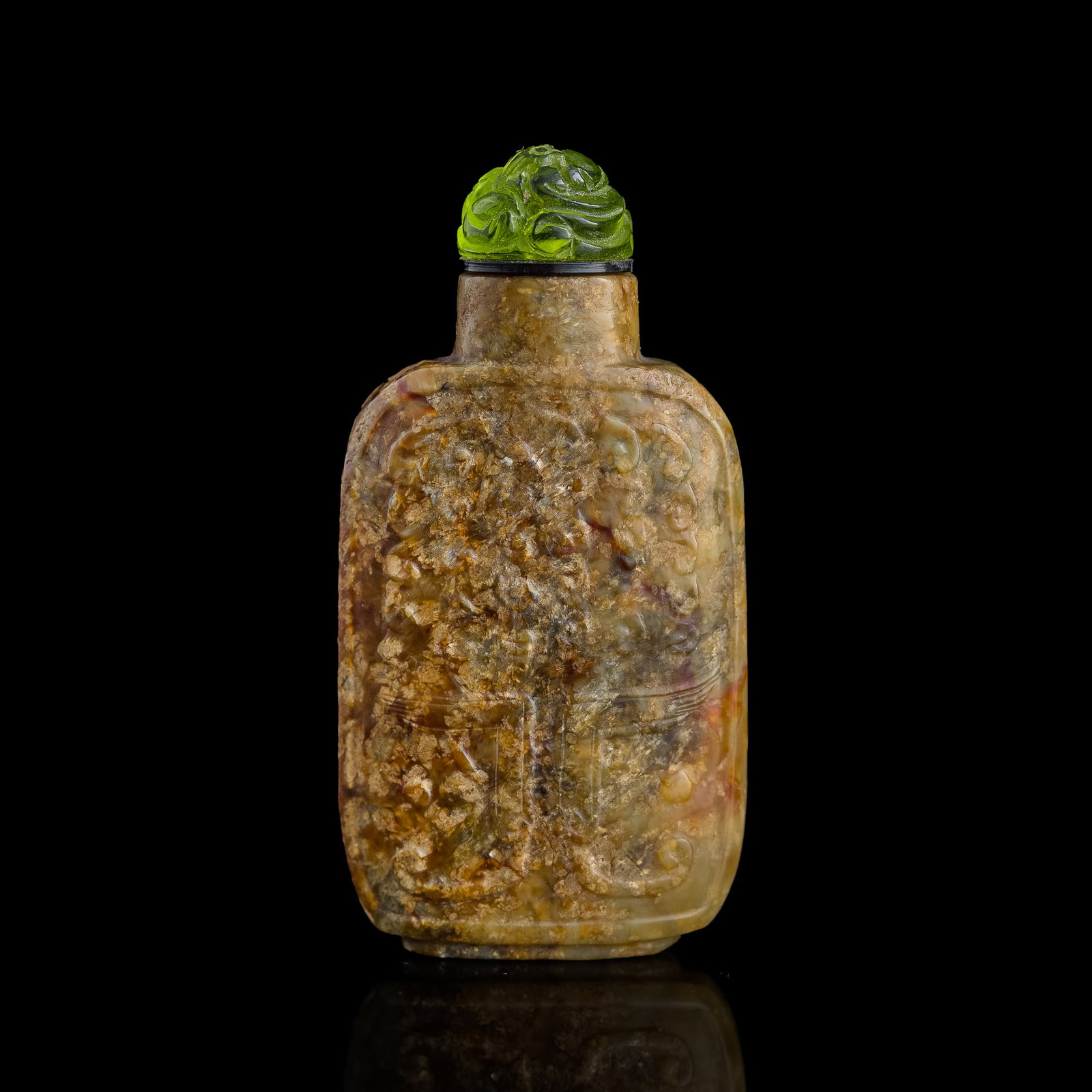 A Chinese carved jade snuff bottle, 18th century: A Chinese carved jade snuff bottle 18th century H: 2 1/2, W: 1 1/2 in. (H: 6.35, W: 3.81 cm.) Provenance: From Mr. Chang, a Chinese-American antiques dealer with 60 years of experience in the field. M