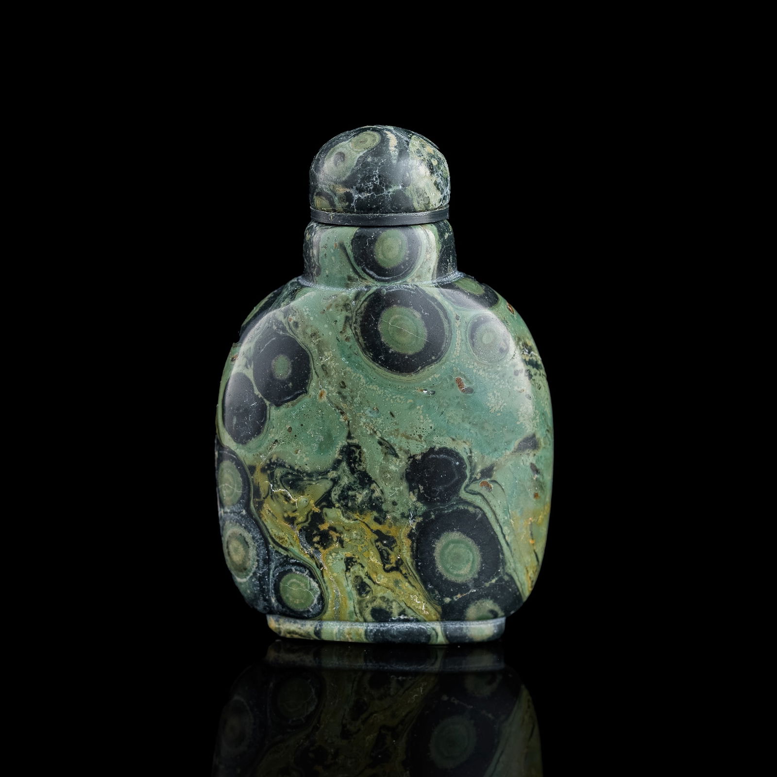 A Chinese carved pudding stone snuff bottle, 19th century (1 of 7)