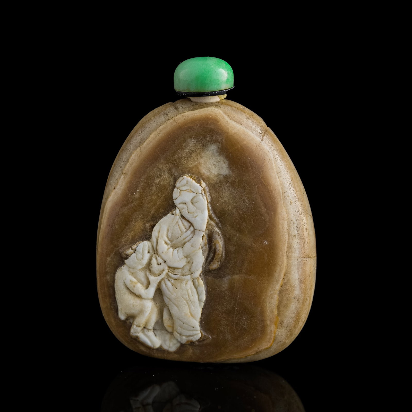 A Chinese carved jade 'figural' snuff bottle, 19th century: A Chinese carved jade 'figural' snuff bottle 19th century H: 2 3/8, W: 1 7/8 in. (H: 6.03, W: 4.76 cm.) Provenance: Private collection, Westbury, New York.