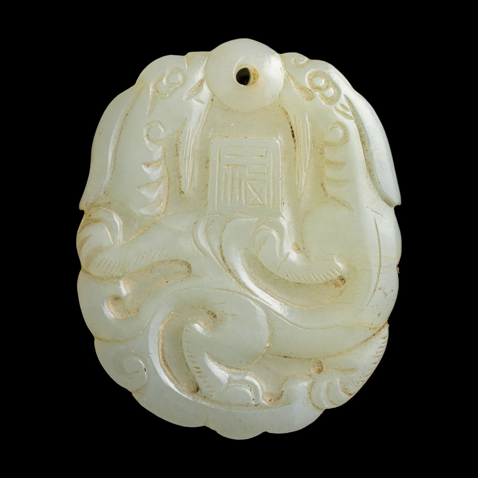 A Chinese carved white jade 'kuilong' and 'phoenix' plaque, 19th century (1 of 3)