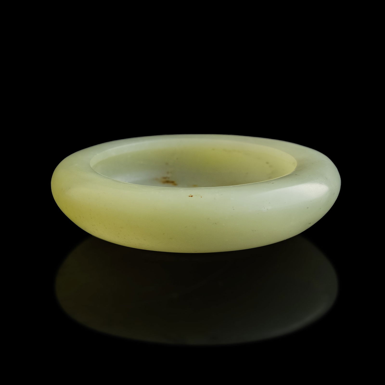 A Chinese carved jade washer, 19th century or later (1 of 6)