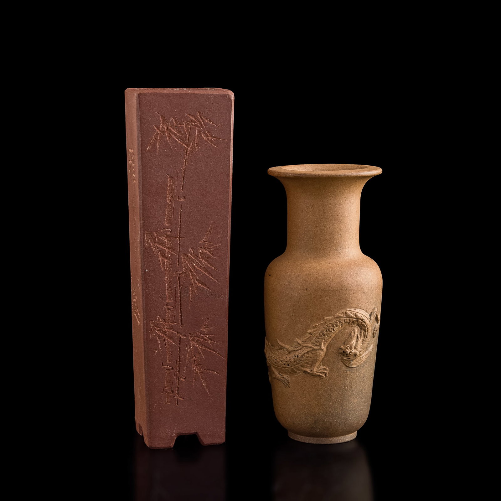 A Chinese zisha 'dragon' vase and planter, Republic period or later: A Chinese zisha 'dragon' vase and planter Republic period or later H: 8 1/2, W: 2 3/8, D: 2 3/8 in. (H: 21.59, W: 6.03, D: 6.03 cm. (largest)) Provenance: Private collection, Florida.