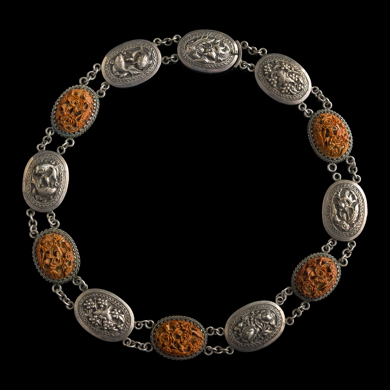 A Chinese export silver and carved pit necklace, late 19th century (1 of 5)