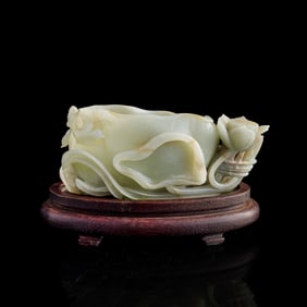 A Chinese carved jade 'lotus'-form washer, 18th century