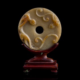 A Chinese carved jade 'chilong' bi, Song dynasty