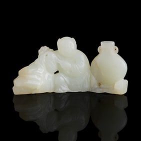 A Chinese white jade 'boy'-form brush holder, 18th century
