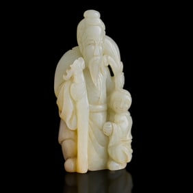 A Chinese carved jade scholar and boy, 19th century