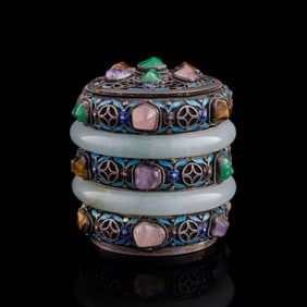 A Chinese silver enameled lidded jar with jadeite bangles