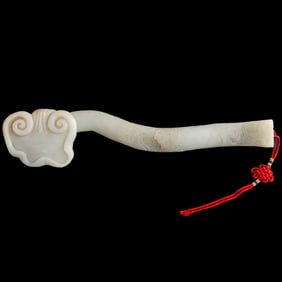 A Chinese white jade 'lingzhi'-form ruyi, early 19th century
