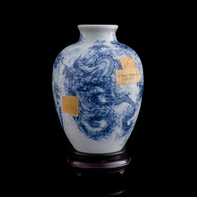 A Chinese blue and white 'cloud and dragon' taibai jar, Yongzheng period, Qing dynasty