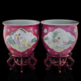 A pair of Chinese ruby red-ground famille rose jardinieres, Republic period