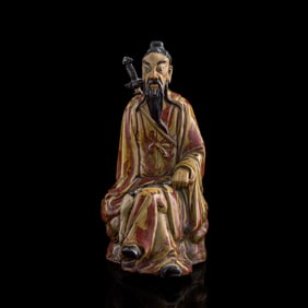 A Chinese Shiwan-kiln figure of Lü Dongbin, by Huang Guzhen (Chinese, 1821-1908), late 19th century