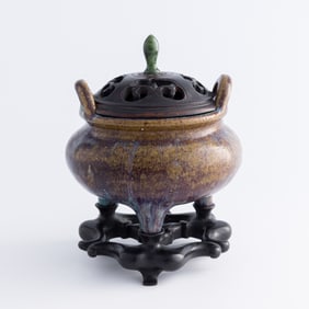 A Chinese Shiwan double-handle tripod censer, 18th century