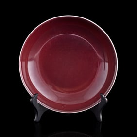 A Chinese copper-red-glazed plate, Qianlong period, Qing dynasty